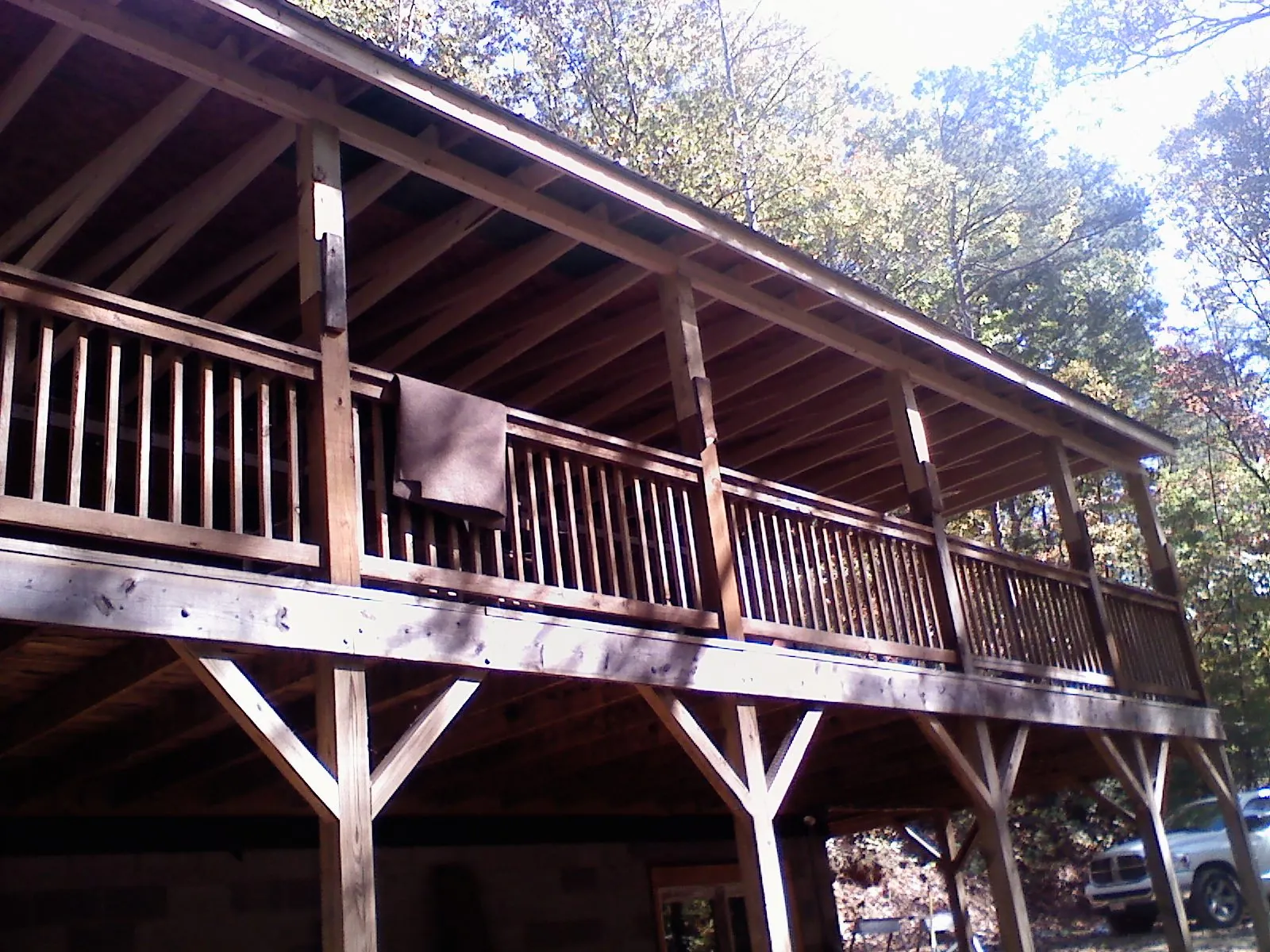 Timber framing under a new elevated porch and deck — Roof Leak Repair in Howard Lake by Roofing Brothers